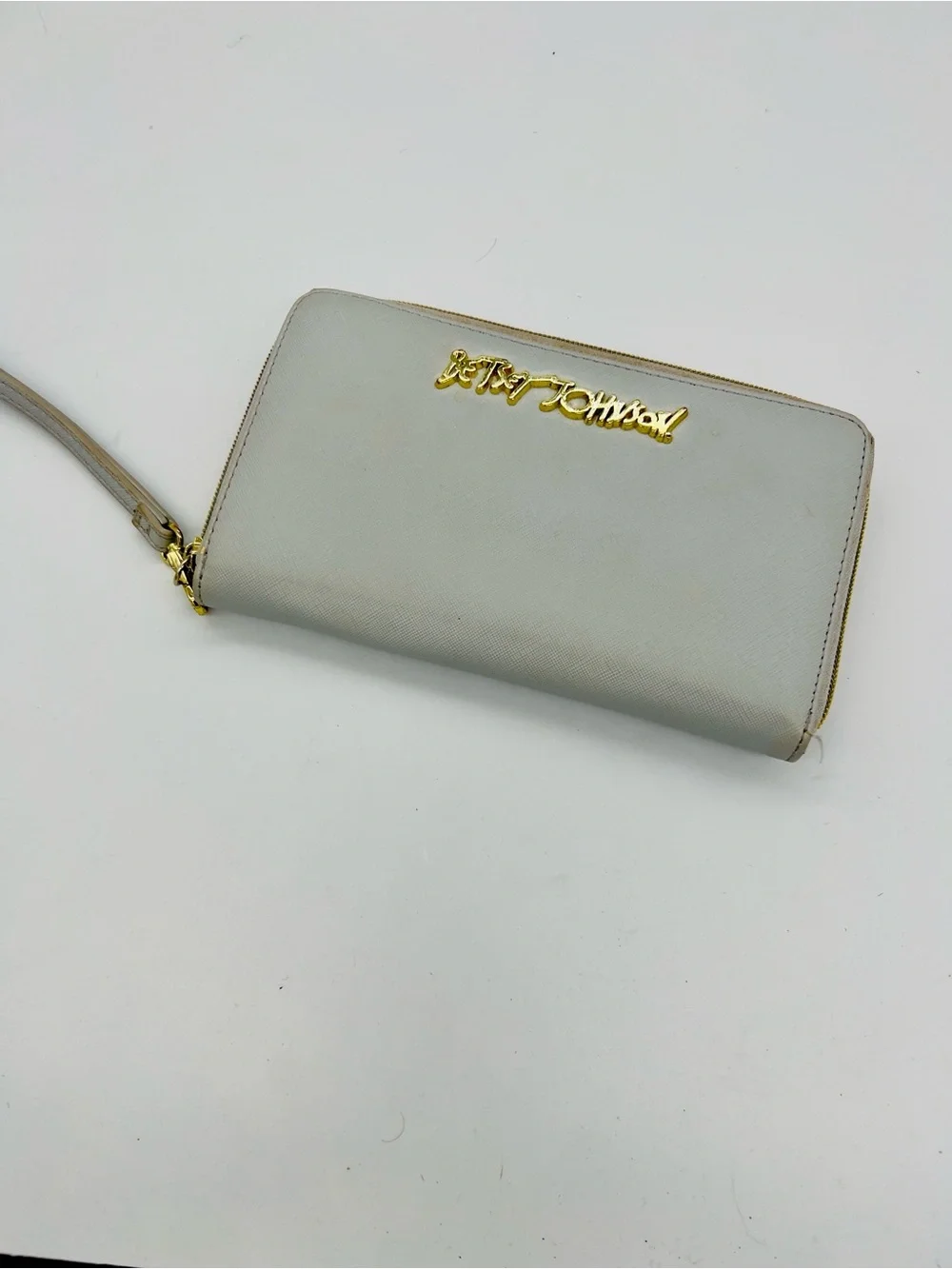 Betsey Johnson Light Gray Zip-Around Wristlet with Gold Logo